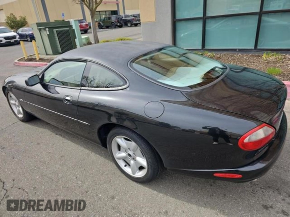 1997 Jaguar XK with VIN SAJGX5747VC007213, listed as a Copart auction lot 45953175 with 82,461 mi miles and Clean Title. Bid and sale history available at DreamBid. Image 3.
