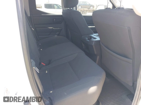 2022 Toyota Tundra with VIN 5TFKB5CDXNX001458, listed as a IAAI auction lot 42640278 with 51,718 mi miles and . Bid and sale history available at DreamBid. Image 8.