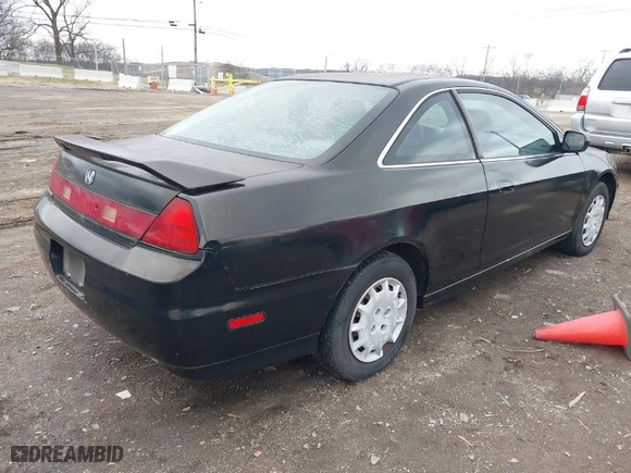 2001 Honda Accord Cpe EX with VIN 1HGCG32501A012049, listed as a IAAI auction lot 41541440 with 229,308 mi miles. Bid and sale history available at carsss.com. Image 4.