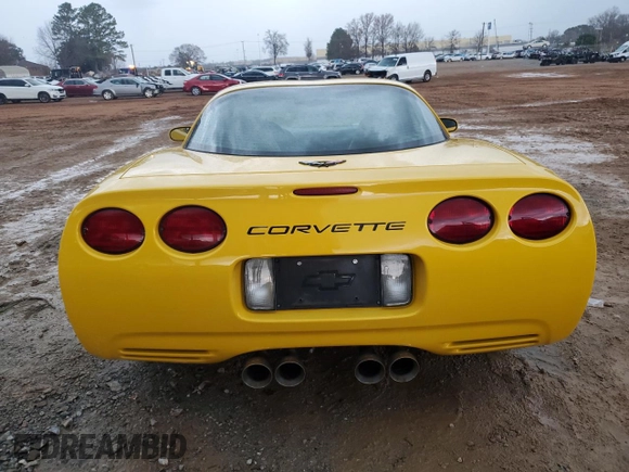 2004 Chevrolet Corvette with VIN 1G1YY22G645102213, listed as a Copart auction lot 84958784 with 77,338 mi miles and Salvage Title. Bid and sale history available at carsss.com. Image 6.