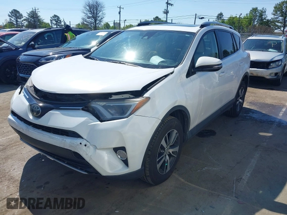 2017 Toyota RAV4 XLE with VIN JTMWFREV8HD107495, listed as a IAAI auction lot 41859546 with 150,503 mi miles and . Bid and sale history available at DreamBid. Image 17.