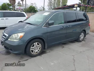2006 Honda Odyssey EX-L with VIN 5FNRL38786B019441, listed as a IAAI auction lot 42074209 with 184,008 mi miles. Bid and sale history available at carsss.com. Image 2.