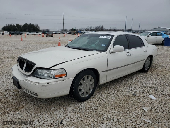 2003 Lincoln Town Car Cartier with VIN 1LNHM83W23Y627418, listed as a Copart auction lot 43817895 with 141,414 mi miles and Salvage Title. Bid and sale history available at carsss.com. Image 1.