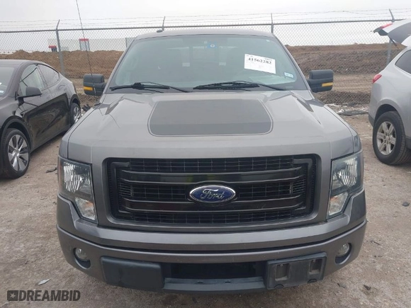 2013 Ford F-150 XL with VIN 1FTFW1CT7DFB60657, listed as a IAAI auction lot 41562282 with 121,633 mi miles. Bid and sale history available at carsss.com. Image 12.