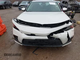 2023 Honda Civic Touring z VIN 2HGFE1F93PH304731, wystawiony jako IAAI lot #41675935 z przebiegiem 27 435 mil mil oraz . Historia ofert i sprzedaży dostępna na DreamBid. Obrazek 6.