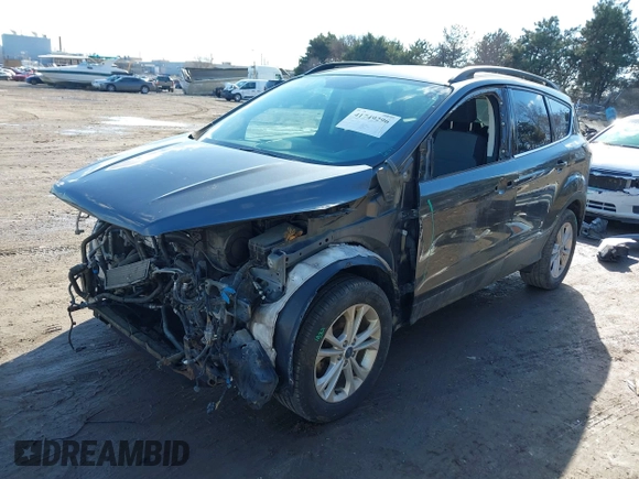 2018 Ford Escape SE with VIN 1FMCU0GD5JUC46932, listed as a IAAI auction lot 41749296 with 111,236 mi miles. Bid and sale history available at carsss.com. Image 18.