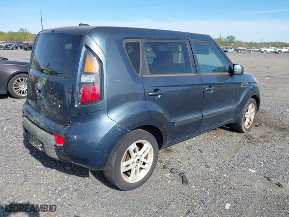 2011 Kia Soul + with VIN KNDJT2A28B7232900, listed as a IAAI auction lot 42093207 with 153,504 mi miles. Bid and sale history available at carsss.com. Image 4.