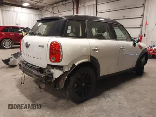 2014 MINI Countryman with VIN WMWZB3C57EWR42476, listed as a IAAI auction lot 41716731 with 94,378 mi miles and . Bid and sale history available at DreamBid. Image 4.