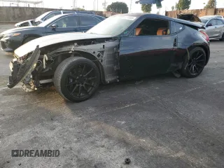 2011 Nissan 370Z Touring with VIN JN1AZ4EH6BM550267, listed as a Copart auction lot 82245804 with 124,466 mi miles and Salvage Title. Bid and sale history available at carsss.com. Image 1.