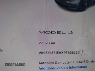 2023 Tesla Model 3 with VIN 5YJ3E1EAXPF666252, listed as a IAAI auction lot 42009929 with 27,328 mi miles and . Bid and sale history available at DreamBid. Image 16.