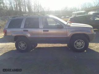 2002 Jeep Grand Cherokee Laredo with VIN 1J4GW48S92C169827, listed as a IAAI auction lot 41621901 with 169,373 mi miles. Bid and sale history available at carsss.com. Image 13.