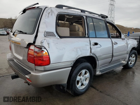 2000 Toyota Land Cruiser z VIN JT3HT05J4Y0088451, wystawiony jako Copart lot #52208905 z przebiegiem 329 751 mil mil oraz Nie do naprawy • Non repairable. Historia ofert i sprzedaży dostępna na DreamBid. Obrazek 3.