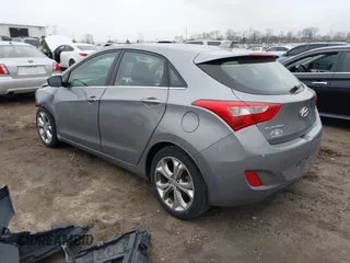 2013 Hyundai Elantra GT with VIN KMHD35LE0DU148382, listed as a IAAI auction lot 41898768 with 77,673 mi miles. Bid and sale history available at carsss.com. Image 3.