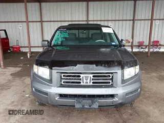 2007 Honda Ridgeline RTL z VIN 2HJYK16537H521608, wystawiony jako IAAI lot #42112626 z przebiegiem 197 076 mil mil oraz . Historia ofert i sprzedaży dostępna na DreamBid. Obrazek 12.
