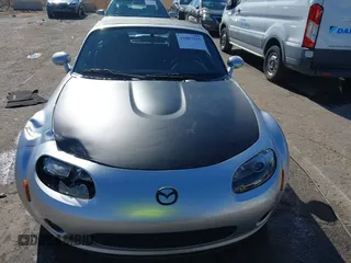 2007 Mazda MX-5 Miata Sport z VIN JM1NC25F170126965, wystawiony jako IAAI lot #41003125 z przebiegiem 99 338 mil mil oraz . Historia ofert i sprzedaży dostępna na DreamBid. Obrazek 12.