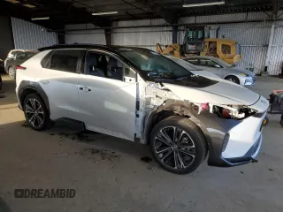2023 Toyota bZ4X XLE with VIN JTMAAAAA7PA009698, listed as a Copart auction lot 47975935 with 15,916 mi miles and Salvage Title. Bid and sale history available at DreamBid. Image 4.