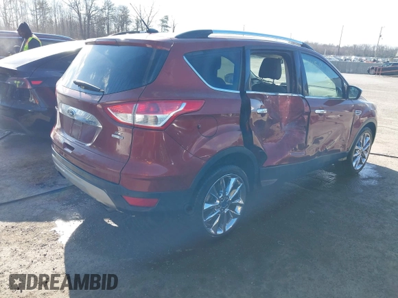 2014 Ford Escape SE with VIN 1FMCU9GX1EUE23044, listed as a IAAI auction lot 41597818 with 165,348 mi miles. Bid and sale history available at carsss.com. Image 4.