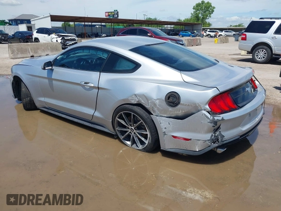 2018 Ford Mustang EcoBoost with VIN 1FA6P8THXJ5128830, listed as a IAAI auction lot 42192673 with 58,817 mi miles and . Bid and sale history available at DreamBid. Image 3.