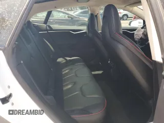 2013 Tesla Model S Performance с VIN 5YJSA1DP3DFP10567, выставлен на аукционе Copart как лот 58352955 с пробегом 128 438 миль миль и Списание • Salvage title. История ставок и продаж доступна на DreamBid. Изображение 10.