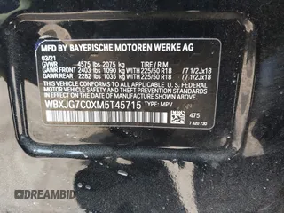 2021 BMW X1 sDrive28i with VIN WBXJG7C0XM5T45715, listed as a IAAI auction lot 42014499 with 23,793 mi miles and . Bid and sale history available at DreamBid. Image 9.