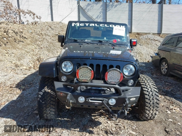 2015 Jeep Wrangler Sahara с VIN 1C4AJWBG7FL703858, выставлен на аукционе IAAI как лот 41720656 с пробегом 110 671 миль миль и . История ставок и продаж доступна на DreamBid. Изображение 13.