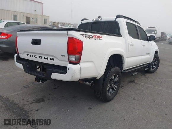 2016 Toyota Tacoma SR with VIN 3TMCZ5AN0GM030469, listed as a IAAI auction lot 41665255 with 178,591 mi miles and . Bid and sale history available at carsss.com. Image 4.