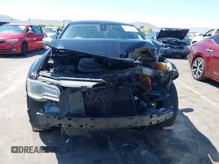 2016 Chrysler 300 C with VIN 2C3CCAEG8GH113057, listed as a IAAI auction lot 42052936 with 543,975 mi miles and . Bid and sale history available at DreamBid. Image 12.