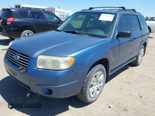 2007 Subaru Forester X with VIN JF1SG63627G718079, listed as a IAAI auction lot 42290134 with 303,089 mi miles and . Bid and sale history available at DreamBid. Image 2.