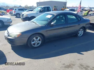 2003 Ford Taurus SE Standard with VIN 1FAFP53U03G240491, listed as a IAAI auction lot 41967252 with 191,151 mi miles. Bid and sale history available at carsss.com. Image 2.