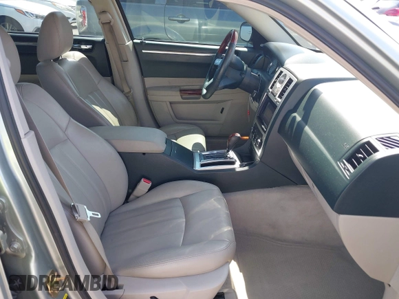 2006 Chrysler 300 C with VIN 2C3LA63H26H130160, listed as a IAAI auction lot 42170192 with 124,206 mi miles. Bid and sale history available at carsss.com. Image 5.