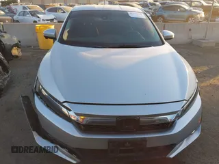2018 Honda Clarity with VIN JHMZC5F15JC018312, listed as a IAAI auction lot 41354648 with 97,035 mi miles and . Bid and sale history available at DreamBid. Image 12.