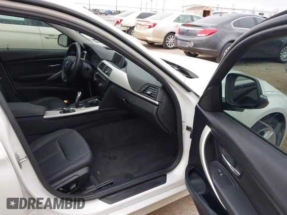2015 BMW 3 Series 320i with VIN WBA3B1C5XFK140734, listed as a IAAI auction lot 42141319 with 84,863 mi miles and . Bid and sale history available at DreamBid. Image 5.