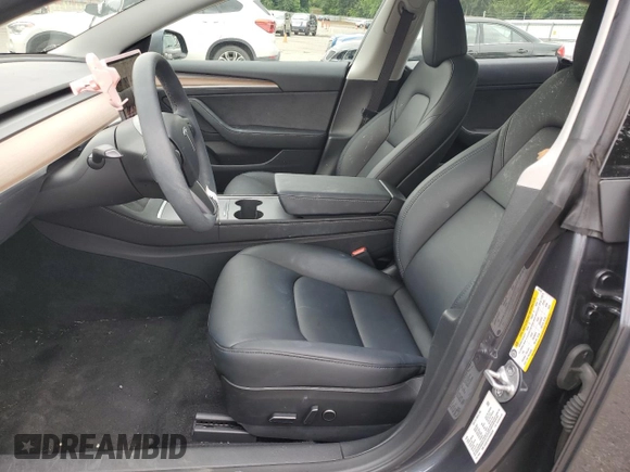 2023 Tesla Model 3 z VIN 5YJ3E1EA7PF683249, wystawiony jako Copart lot #56234465 z przebiegiem 9 494 mil mil oraz Szkoda całkowita • Salvage title. Historia ofert i sprzedaży dostępna na DreamBid. Obrazek 7.