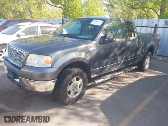 2005 Ford F-150 XLT with VIN 1FTPX14585NB56142, listed as a IAAI auction lot 42168338 with 208,074 mi miles. Bid and sale history available at carsss.com. Image 2.