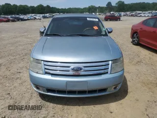 2008 Ford Taurus Limited z VIN 1FAHP25WX8G181771, wystawiony jako Copart lot #58026275 z przebiegiem 187 911 mil mil oraz Tytuł czysty. Historia ofert i sprzedaży dostępna na DreamBid. Obrazek 5.