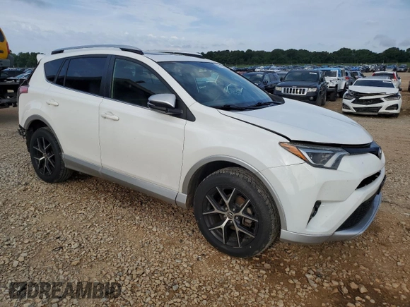 2016 Toyota RAV4 SE with VIN JTMJFREV5GD184074, listed as a Copart auction lot 60116955 with 182,240 mi miles and Salvage title. Bid and sale history available at DreamBid. Image 4.