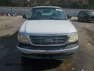 2003 Ford F-150 XL with VIN 1FTRF17W33NA54471, listed as a Copart auction lot 42594765 with 134,409 mi miles and Salvage Title. Bid and sale history available at DreamBid. Image 5.