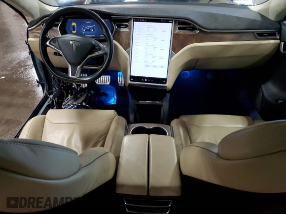 2016 Tesla Model S 90D z VIN 5YJSA1E40GF172712, wystawiony jako Copart lot #63698725 z przebiegiem 99 405 mil mil oraz Szkoda całkowita • Salvage title. Historia ofert i sprzedaży dostępna na DreamBid. Obrazek 8.