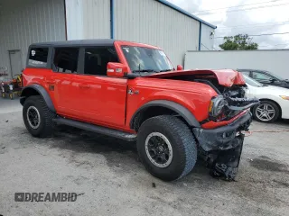 2022 Ford Bronco с VIN 1FMEE5DP9NLB49973, выставлен на аукционе Copart как лот 56214605 с пробегом 23 697 миль миль и Списание • Salvage title. История ставок и продаж доступна на DreamBid. Изображение 4.