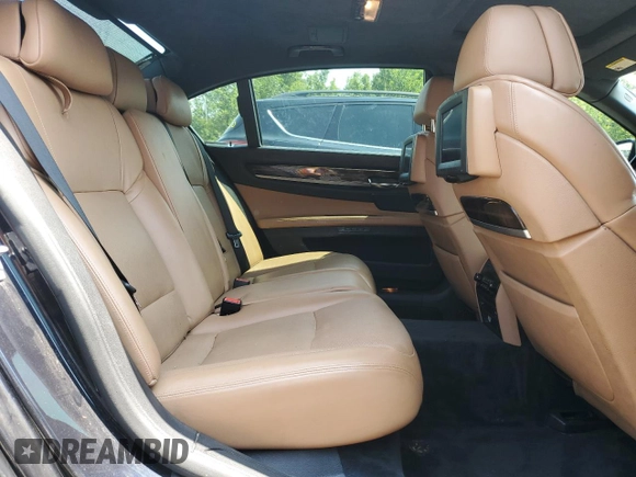 2011 BMW 7 Series с VIN WBAKB0C58BCY40214, выставлен на аукционе Copart как лот 64976145 с пробегом 74 319 миль миль и Чистый • Clean title. История ставок и продаж доступна на DreamBid. Изображение 10.
