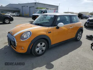 2014 MINI Hardtop with VIN WMWXM5C58ET933445, listed as a Copart auction lot 52769425 with 55,391 mi miles and Salvage Title. Bid and sale history available at DreamBid. Image 1.