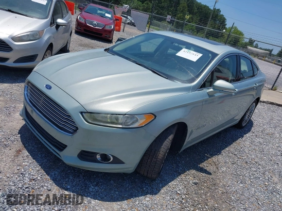 2013 Ford Fusion SE Hybrid z VIN 3FA6P0LU4DR259073, wystawiony jako IAAI lot #42197143 z przebiegiem 87 337 mil mil oraz . Historia ofert i sprzedaży dostępna na DreamBid. Obrazek 2.