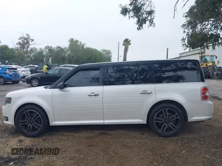 2015 Ford Flex SEL z VIN 2FMGK5C89FBA02548, wystawiony jako IAAI lot #41775436 z przebiegiem 132 856 mil mil oraz . Historia ofert i sprzedaży dostępna na DreamBid. Obrazek 14.
