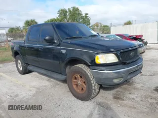 2003 Ford F-150 XLT with VIN 1FTRW08L63KB49817, listed as a IAAI auction lot 41117433 with Not provided miles and . Bid and sale history available at DreamBid. Image 1.