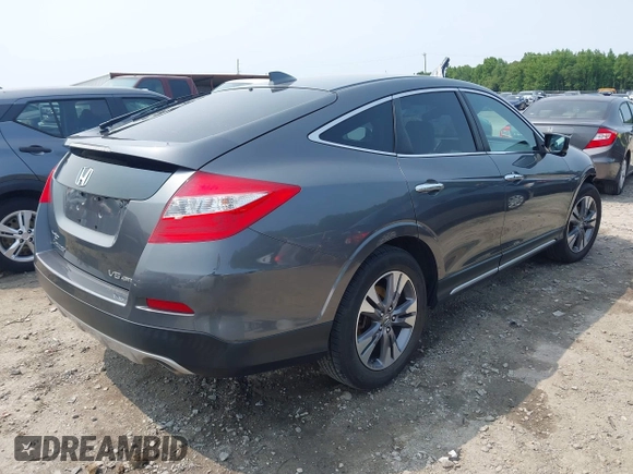 2014 Honda Crosstour EX-L z VIN 5J6TF2H59EL000957, wystawiony jako IAAI lot #42383656 z przebiegiem 116 317 mil mil oraz . Historia ofert i sprzedaży dostępna na DreamBid. Obrazek 4.