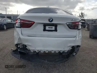 2019 BMW X6 xDrive35i with VIN 5UXKU2C5XK0Z64512, listed as a Copart auction lot 52157073 with 59,988 mi miles. Bid and sale history available at carsss.com. Image 6.