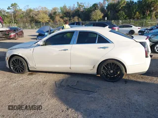 2014 Cadillac ATS Standard RWD z VIN 1G6AA5RA7E0128501, wystawiony jako IAAI lot #41780110 z przebiegiem 78 367 mil mil oraz . Historia ofert i sprzedaży dostępna na DreamBid. Obrazek 14.