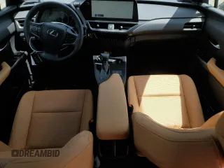 2024 Lexus UX 250h Premium z VIN JTHP9JBH4R2071151, wystawiony jako Copart lot #59289934 z przebiegiem 3 861 mil mil oraz Szkoda całkowita • Salvage title. Historia ofert i sprzedaży dostępna na DreamBid. Obrazek 8.