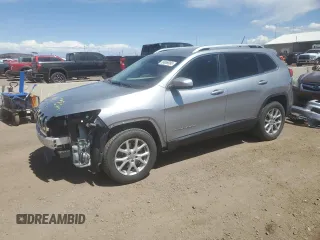 2015 Jeep Cherokee Latitude with VIN 1C4PJMCB6FW734003, listed as a Copart auction lot 54659085 with 146,379 mi miles and Salvage Title. Bid and sale history available at DreamBid. Image 1.