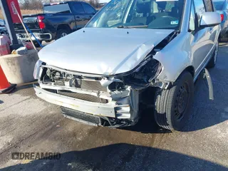 2010 Suzuki SX4 z VIN JS2YB5A3XA6300488, wystawiony jako IAAI lot #41121293 z przebiegiem 232 931 mil mil oraz . Historia ofert i sprzedaży dostępna na DreamBid. Obrazek 6.